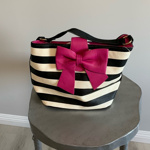 Betsey Johnson Handbags - Betsey Johnson Buckle Bag with pink bow,  no shoulder strap included.
